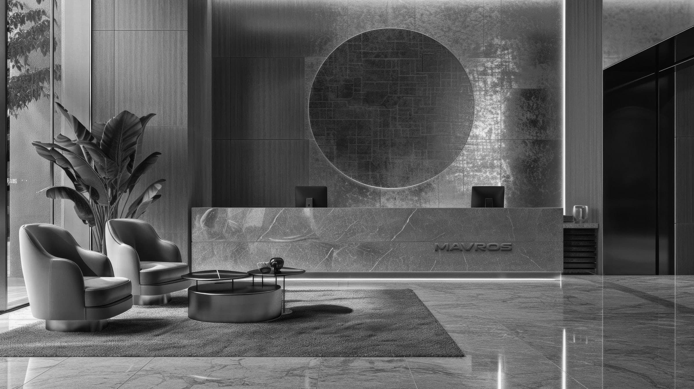 The Mavros reception lobby with a backlit circular feature wall and lounge seating
